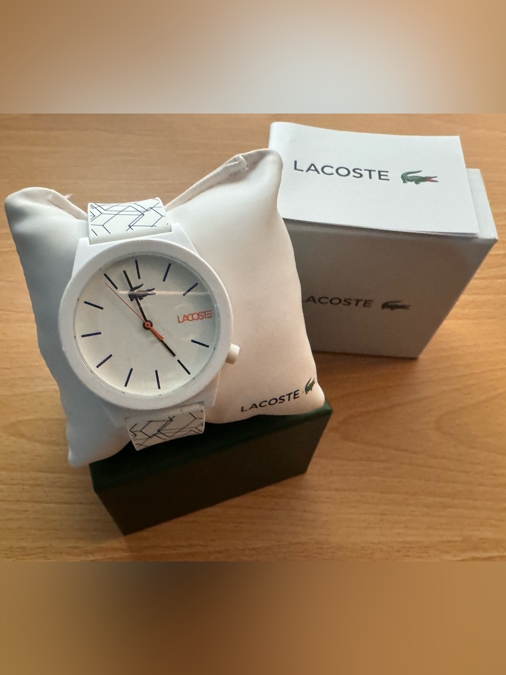 Lacoste White Minimalist Watch with Blue Geographical Line Pattern